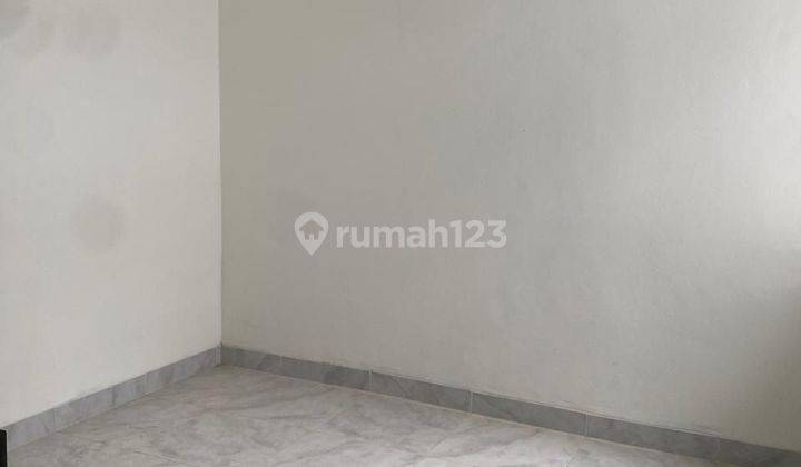 Rumah Baru Renovasi 2 Lantai Murah Siap Huni di Cluster Kintamani 
Daan Mogot Baru 
Tangerang Banten _ j10 2