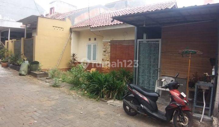 Rumah Lelang Murah Di Cluster Griya Flora Tanah Baru Beji Depok 2