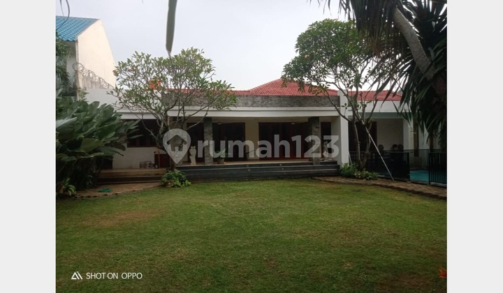 For Sale: 4-Bedroom Family Home with Spacious Land & Carport – Rp 21M, Safe and Strategic Location