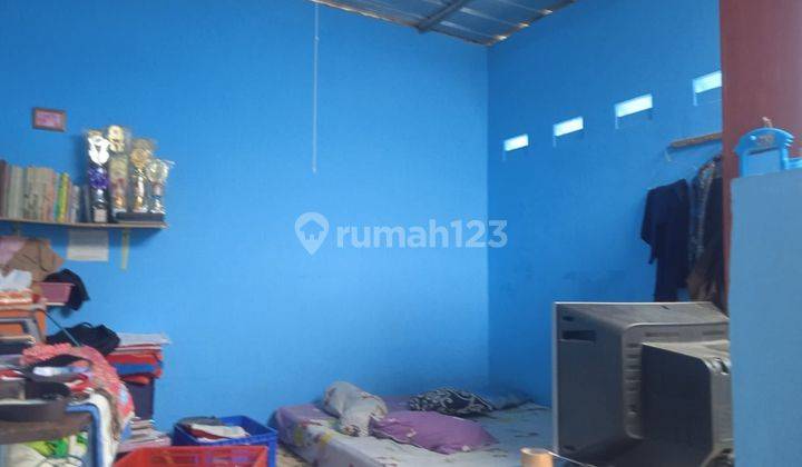 kamar tidur rumah 2 lantai di graha
