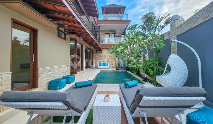 Luxury Villa with Blue Sea Views & Paragliding Thrills from the Rooftop in Nusa Dua