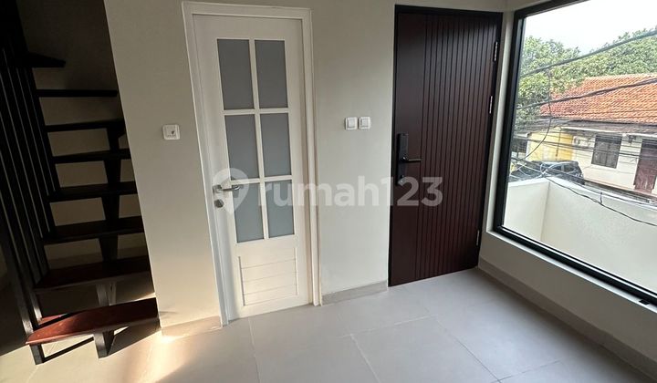 New 3-Story House Furnished with 2-Car Carport and 3 AC Units 2