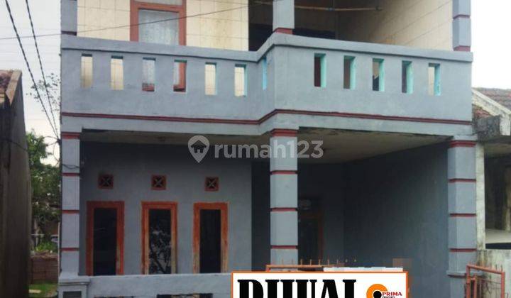 Rumah 2 Lantai Bagus Unfurnished SHM di Bumi Orange, Bandung 1