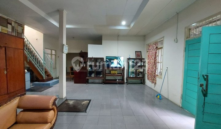 Warehouse Plus House by Antapani Roadside