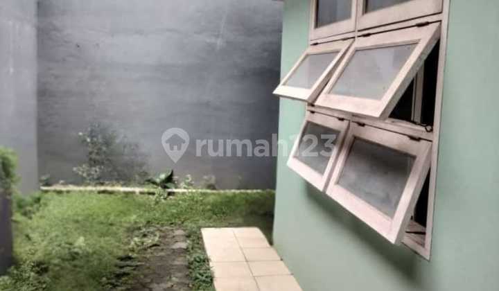 Nice house, wide road, inside a cluster in Graha Raya. 2