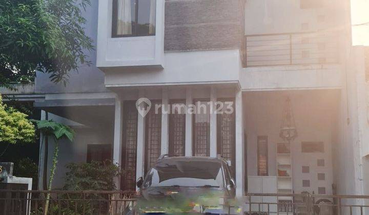 Rumah di Graha Bunga, 2 lantai dengan carport di Graha Raya 1