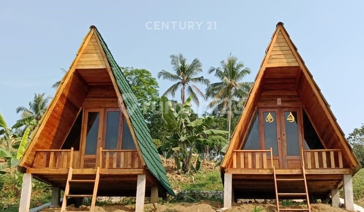 For Sale: Strategic Plots with 2 Wooden Houses Already Built in Cileungsi. For Sale: Strategic Plots with 2 Wooden Houses Already Built in Cileungsi.