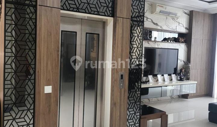 Pakuwon Indah Grand Embassy  Rumah Minimalis Full Furnish w/ Private Lift 2