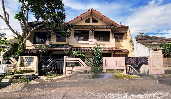 rumah dan bangunan cukup luas dan strategis daerah tajinan 1