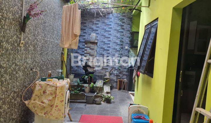 rumah nuansa bali di perumahan graha dewata kota malang 2