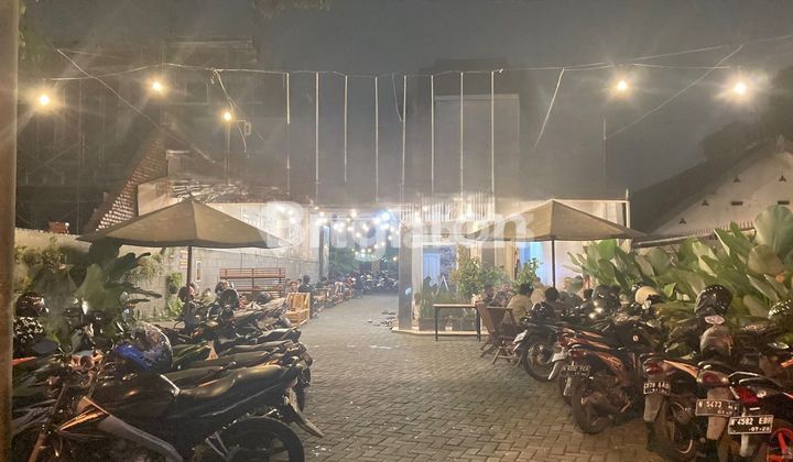 active coffee shop on singosari main road, malang city