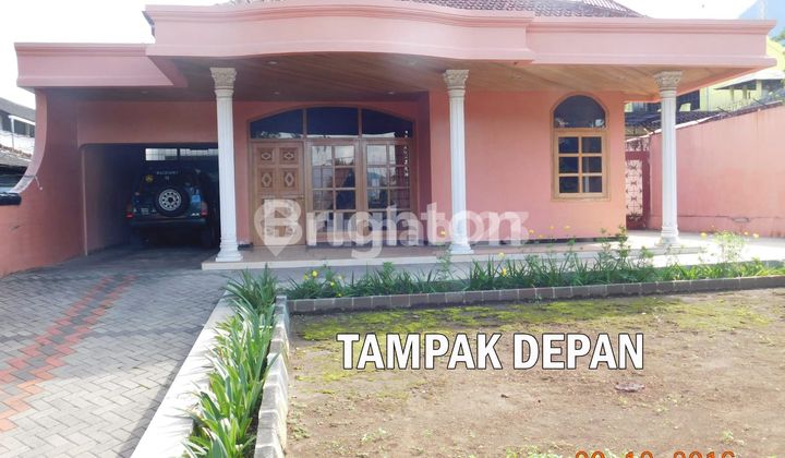 house on the side of a main road in Batu city