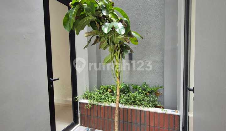 New Tropical House Front Cheap Price Vanya Park Bsd 2