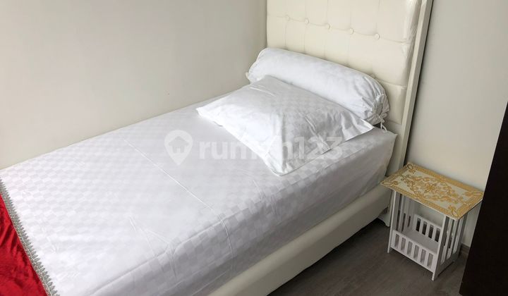 kamar tidur sudirman suites apartemen, jakarta pusat,