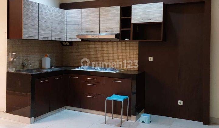 RUMAH TKI 1 SEMI FURNISHED TIDAK JAUH DARI MAINROAD 1