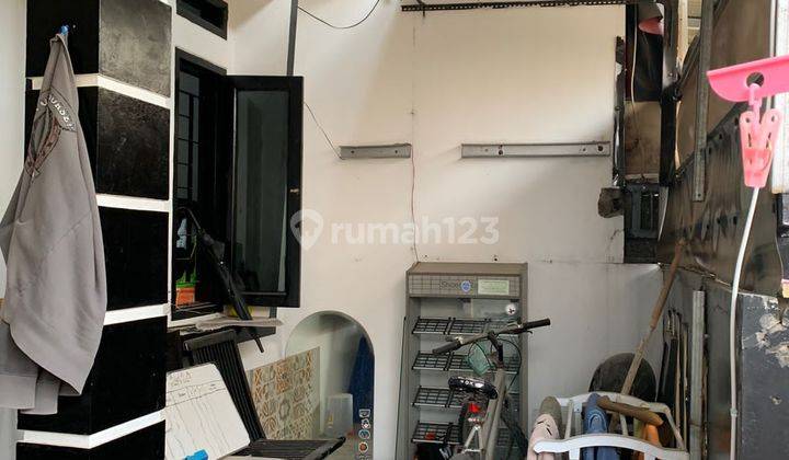 RUMAH MURAH BANGUNAN DUA LANTAI DI KOMPLEK KIARA SARI PERMAI 2