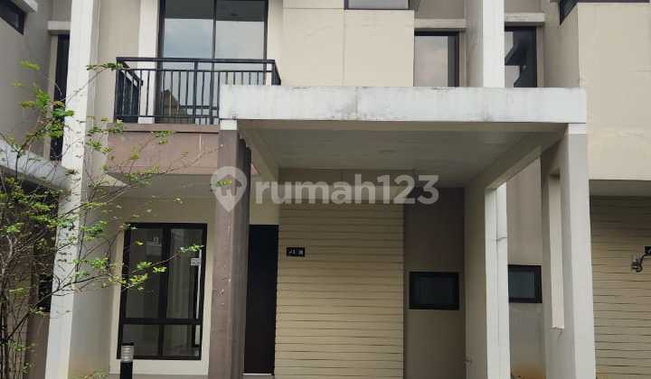 A 2-story house inside the Podomoro Golf View Residence cluster.