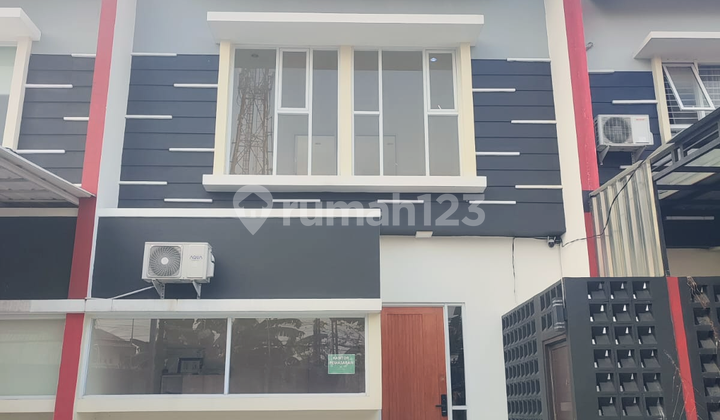 Rumah Cluster 2 Lantai Full Furnish Dengan Fasilitas Smart Home, CCTV dan Free Kanopi Cantik Lokasi Strategis 1