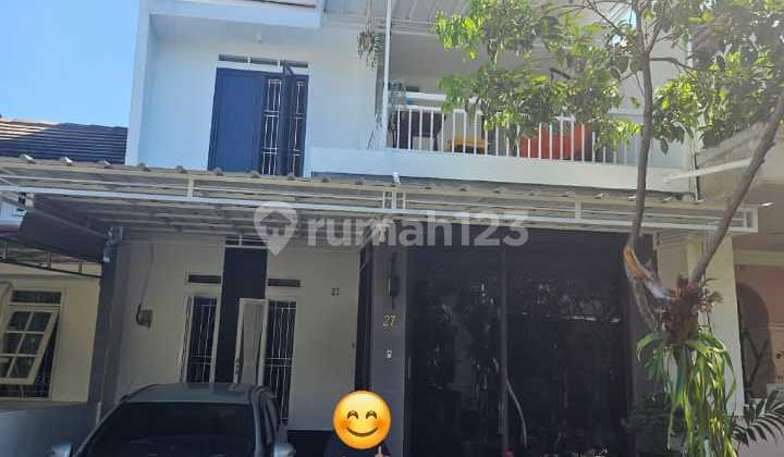 For sale fully furnished house in a cluster in front of Sentul City, price negotiable.