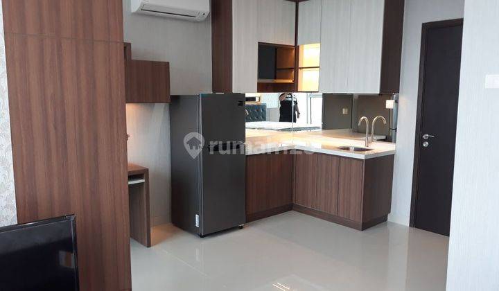 Apartemen Studio Full Furnished Lantai Atas Siap Huni Secepatnya 1