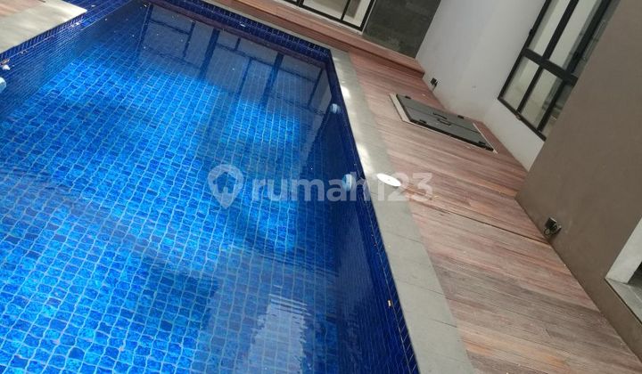 Rumah Contemporary Tropical Modern di Emerald Cove, Gading Serpong, Tangerang 2