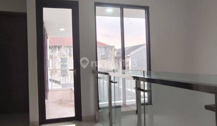 Rumah 2 Lnatai Modern di Jatiwaringin, Bekasi 17