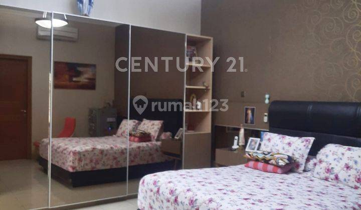 RUMAH ASRI CANTIK SEMI FURNISHED SIAP HUNI DI PERMATA BUANA 2