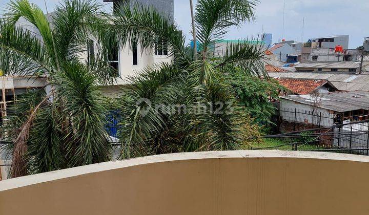 Rumah di Green Garden luas 112 (8x14)  2 Lantai SHM Bagus Timur 1