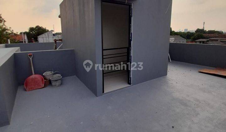 Rumah 2,5 Lantai dg Rooftop Lokasi Pondok Ranji Bintaro Free Biaya2 8