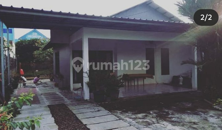 Dijual: Rumah + Kios Pinggir Jalan Raya Sawangan - 1 Menit ke Pintu Tol Desari!"