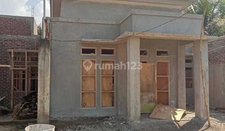 Rumah Mewah Murah Bonus Kolam Ikan Dekat Jalan Raya Di Bandung 1
