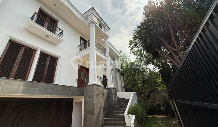 Spacious modern house with a pool located in a quiet and strategic area of Pondok Indah.
