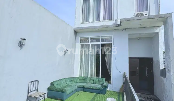 RUNGKUT HARAPAN MINIMALIS MODEL VILLA TIGA LANTAI  2