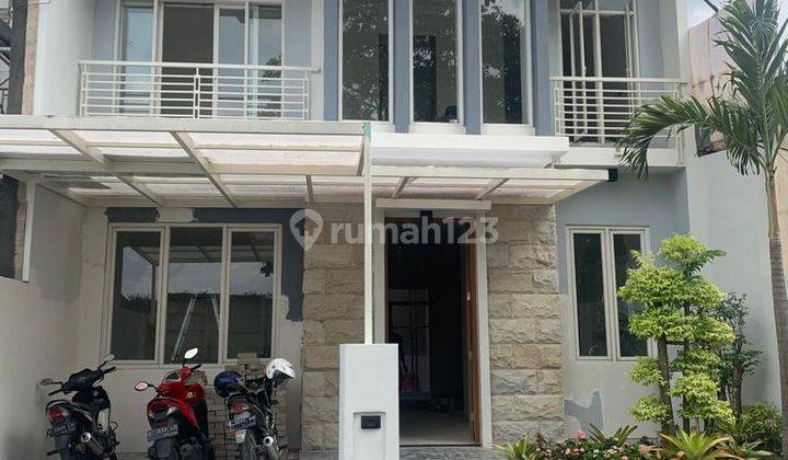 Rumah Taman Puspa Raya Citraland Surabaya Dijual Cepat 1