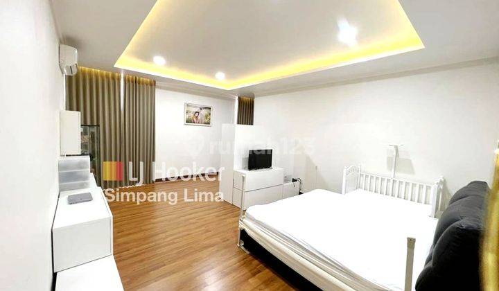 Dijual Rumah Minimalis Modern di Jalan Sutorejo , Surabaya 11.460 aud  2