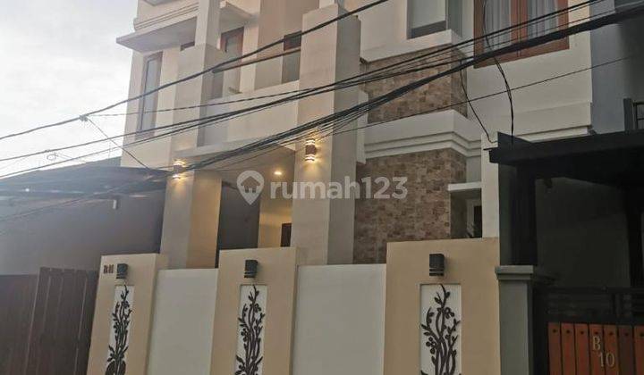 Rumah bagus kembangan baru uk 9x15 3 lantai shm jakarta barat  8