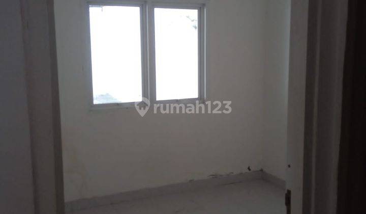 kamar tidur rumah di villa nusa indah