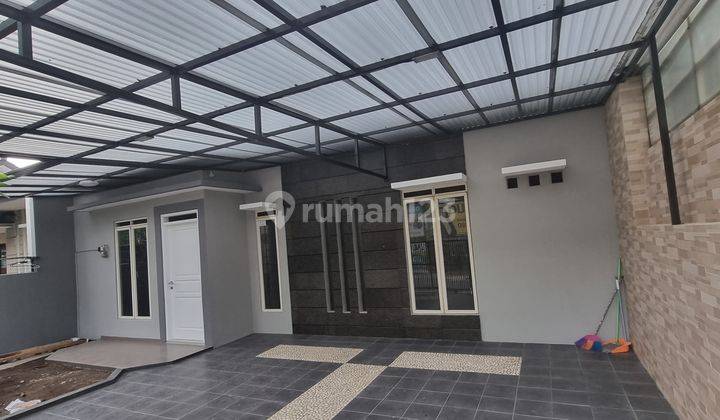 Rumah minimalis di taman holis indah 2  cepat 1