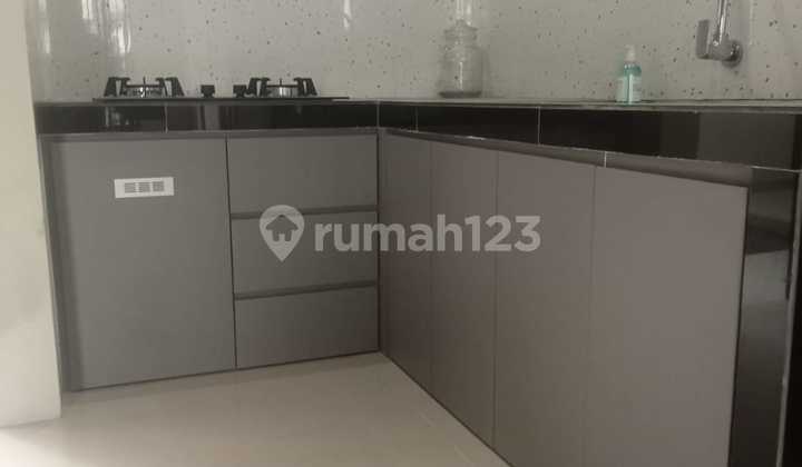 Rumah modern 2 lantai dalam cluster di Kiwi Graha bintaro 