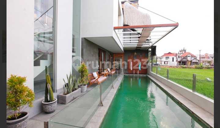 BUC Desperately Need Money Immediately Price 11M Down to 7M Net Villa For Sale Freehold Modern Villa Kunti Seminyak, Bali 1