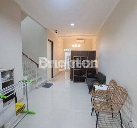 ruang tamu rumah adem di citra sentul