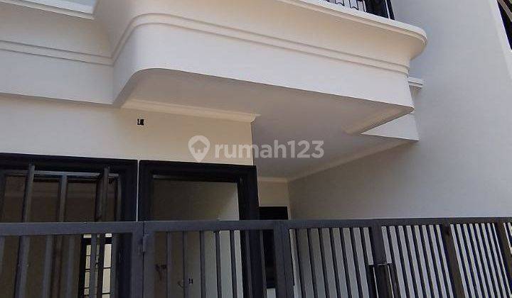 di jual rumah baru siap huni rumah bagus baru jadi lokasi di kalimulya cilodong harga sudah termasuk biaya biaya gratis ac ,torent lokasi strategis deket stasiun dan terminal depok 2