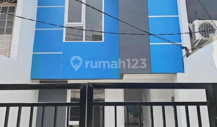 0408JA NEW 2-Story House, Wide Road for 2 Cars, IDR1.8m Slightly Negotiable, Neat & Clean. Contact for Property Sales, Purchases, Rentals. WhatsApp Antolukas at 0813 1535 7990.
