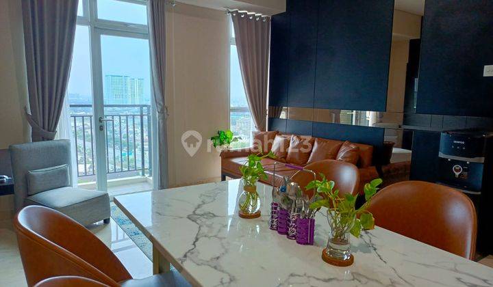 Disewakan Apartemen Puri Orchard 2 BR Hadap City Full Furnished 1