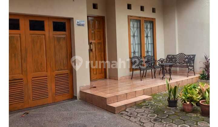 Two-Story House on Wide Road in Kebon Jeruk, West Jakarta.