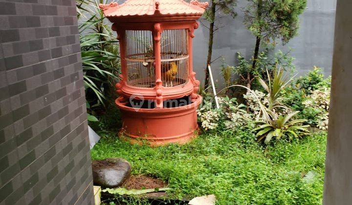 Rumah cantik luas cluster taman giri loka 2