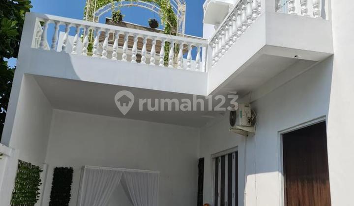 Rumah Hook dengan Kolam Renang di Citra Grand 2