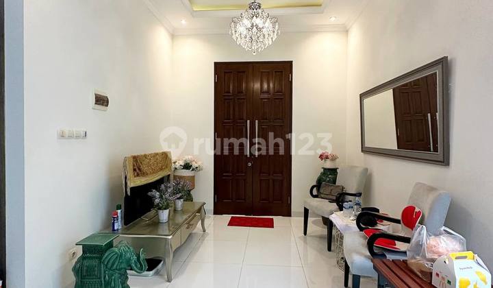 Rumah American Classic Dalam Cluster di Bambu Apus Jakarta Timur Rumah American Classic Dalam Cluster di Bambu Apus Jakarta Timur