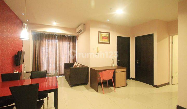 Jual Apartemen Cosmo Residence 2 Bedroom Lantai Tengah Furnished 1