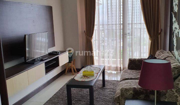 Sewa Apartemen Cosmo Mansion Thamrin City 2 Bedroom Lantai Tengah 1